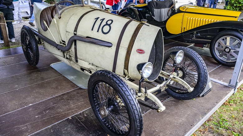 A white vintage Bugatti Type 22 parked on display