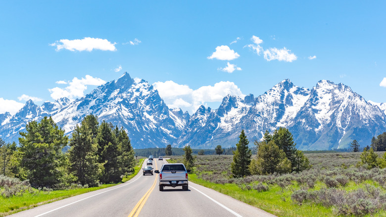 Cars driving through rural Wyoming