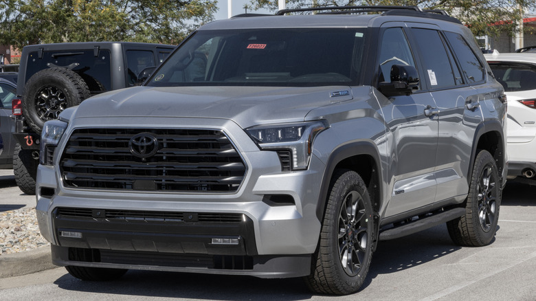 The front-left 3/4 view of a silver 2026 Toyota Sequoia in a parking lot