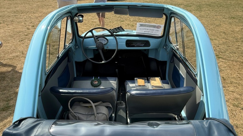 The interior through the roll-top opening of a 1960 Vespa 400.
