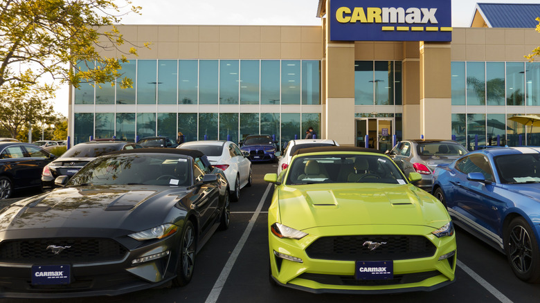 SAN DIEGO, CALIFORNIA - APRIL 24: Ford Mustangs and other used vehicles or sale are parked in a lot at a CarMax dealership on April 24, 2025 in San Diego, California. (Photo by Kevin Carter/Getty Images)