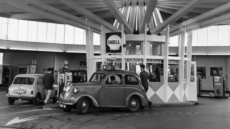 Classic car filling up at a gas station