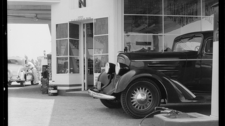 1930s car at a gas station