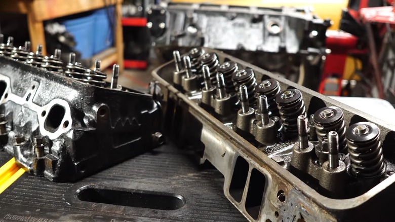 A close-up of Vortec cylinder heads on a workbench