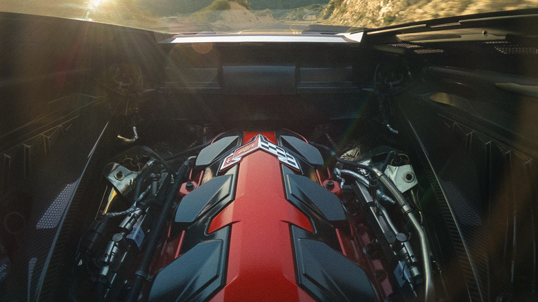 A C8 Corvette LS6 V8 engine with a red engine cover.