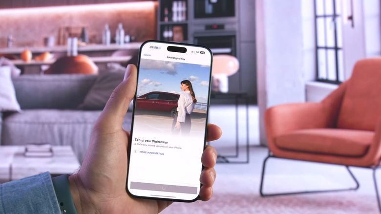 A person using BMW Digital Key setup on an iPhone