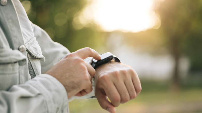 A person using an Apple Watch