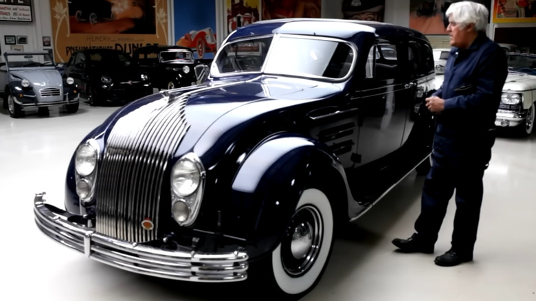 Jay Leno showing off his 1934 Chrysler Airflow.