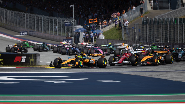 Formula One cars racing at the Austrian Grand Prix in 2025.
