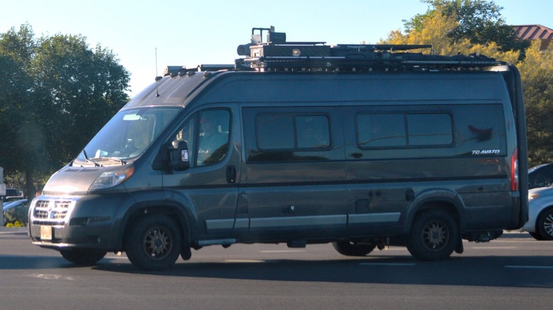 Class B RV parked outside.