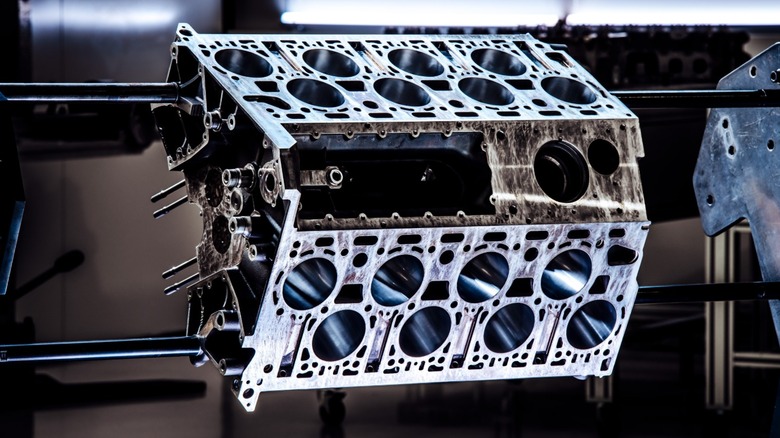 A Bugatti W12 engine suspended by rods.