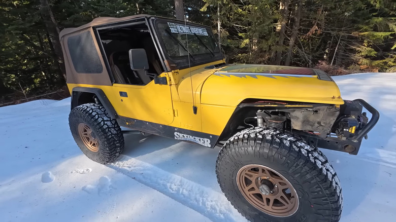 The Dirthead butter Jeep snow crawling