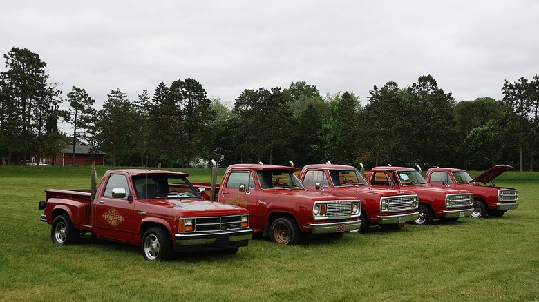 A Dodge Dakota L'il Red Express Truck parked alongside D-Series examples