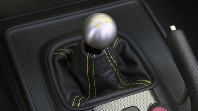A close-up of the shifter in a 2009 Honda S2000 CR.