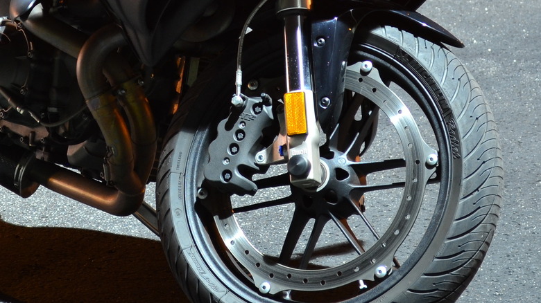 A closeup shot of a 2009 Buell 1125R's front brake.