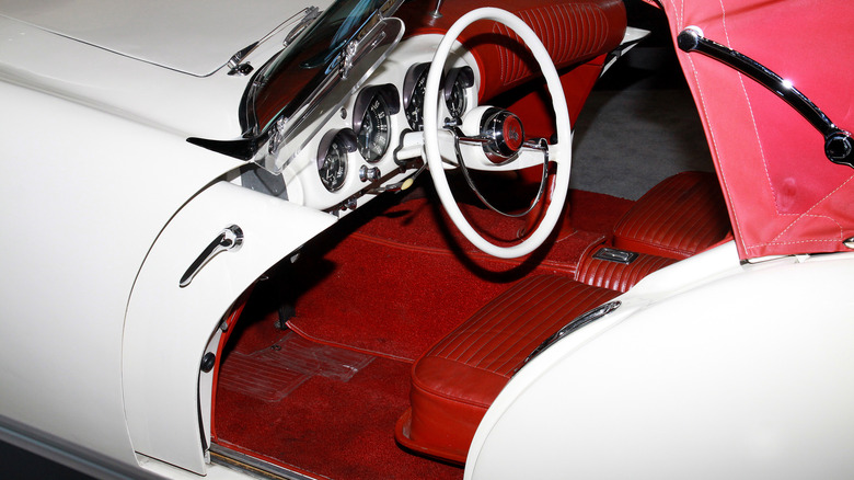 A closeup of the Kaiser Darrin sliding door and the lack of entry space