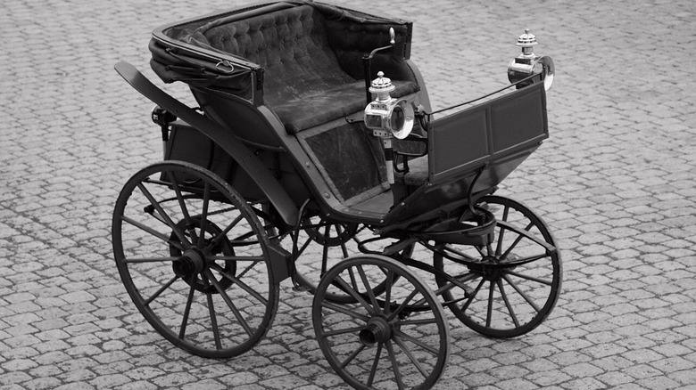 A black and white photo of an 1888 Flocken Elektrowagen