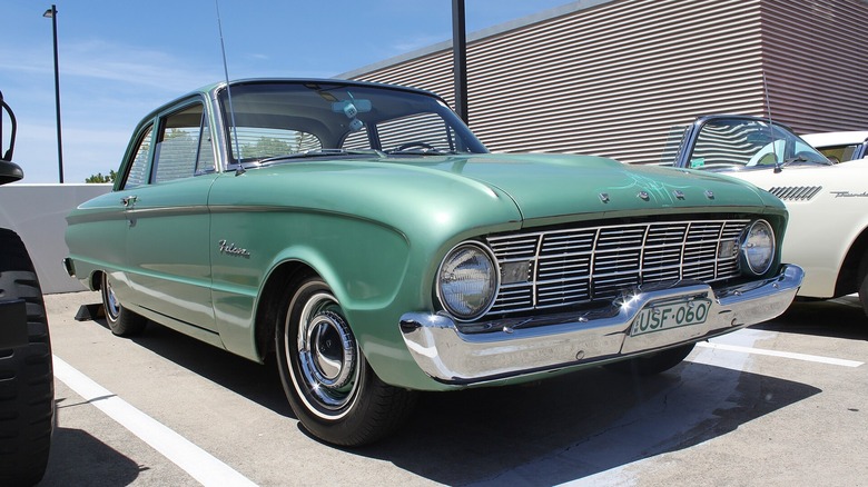 Dramatic front 3/4 of 1960 Ford Falcon in parking space.