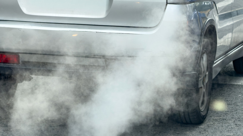 Emissions coming from the tailpipe of a car