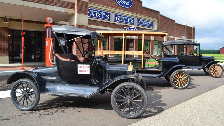 A fleet of Model Ts parked outside the Gilmore Car Museum