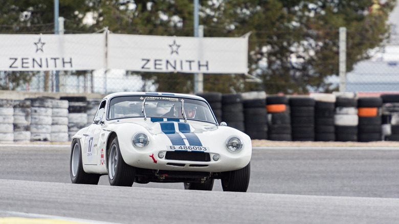 A white Griffith 200 race car pictured on track