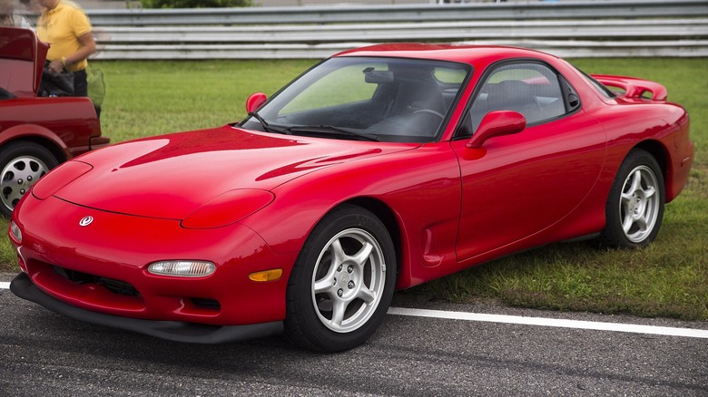 A red 1994 Mazda RX-7 R2.