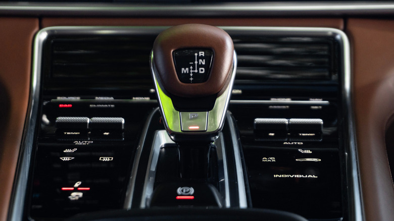 Porsche Panamera PDK shift lever surrounded by brown leather