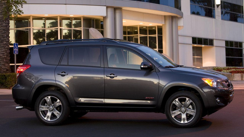 a toyota parked in front of an office building