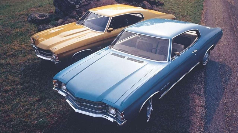 two chevys parked next to each other