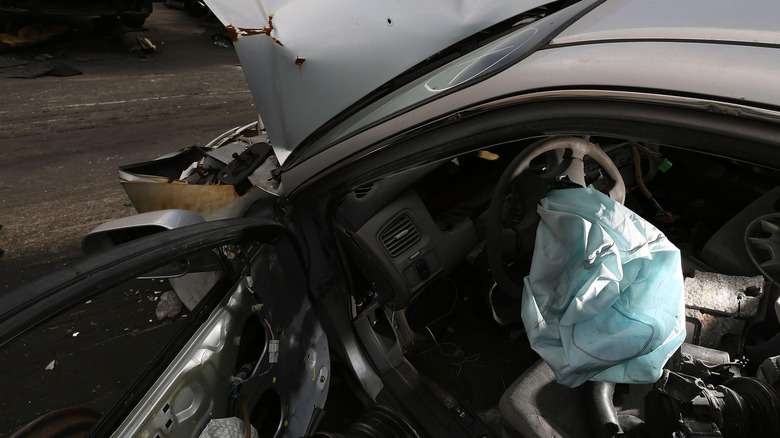 A car after a crash with airbag deployed