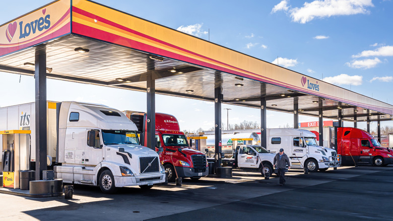 Several semis parked at a Love's fuel station