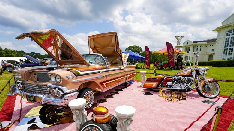 Car and motorcycle displayed at the Rick Ross Car and Boat Show