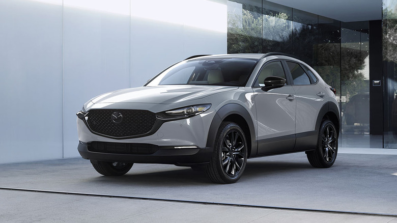 Front 3/4 view of a gray Mazda CX-30