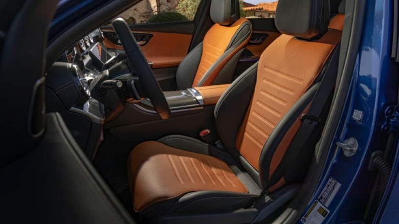 A shot of the front seats in a 2022 Mercedes-Benz C-Class sedan
