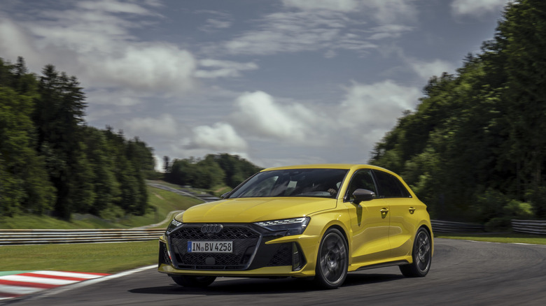2026 Audi RS3 Sportback on track front 3/4 view