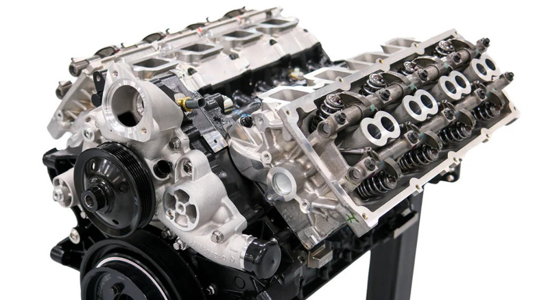 A Direct Connection 1200 426 supercharged HEMI engine on a display against a white background.