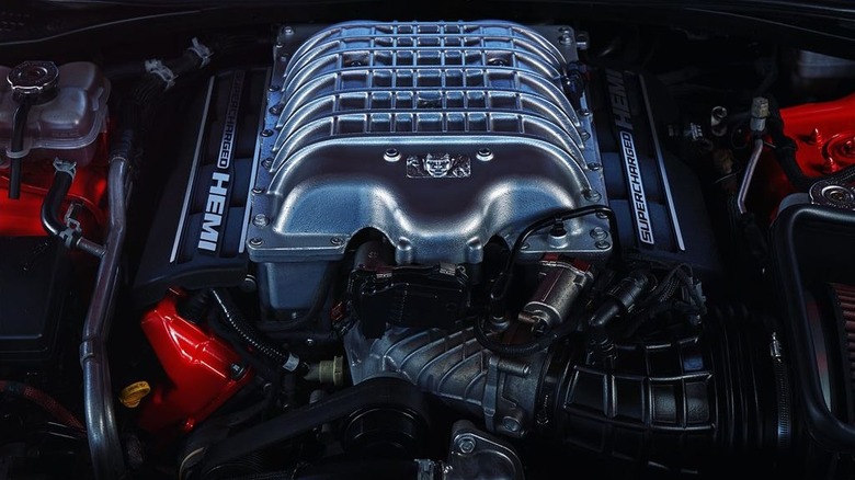 A close up of the supercharged HEMI V8 Demon engine in a car.