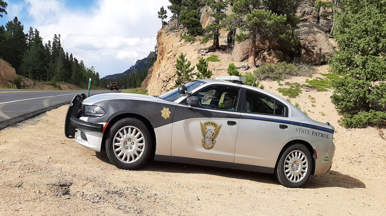 A Colorado Highway Patrol car parked on the roadside in Colorado
