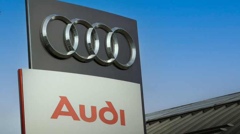 Audi emblem at one of Audi's auto dealerships, Audi is a German automobile manufacturer that designs, engineers, produces, markets and distributes luxury automobiles, Warsaw,Poland, June 21, 2024