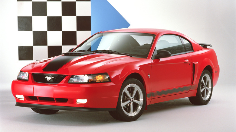 A red 2003 Ford Mustang Mach 1