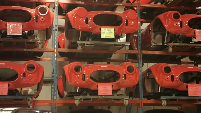 A group of Shelby Cobra kit car body shells