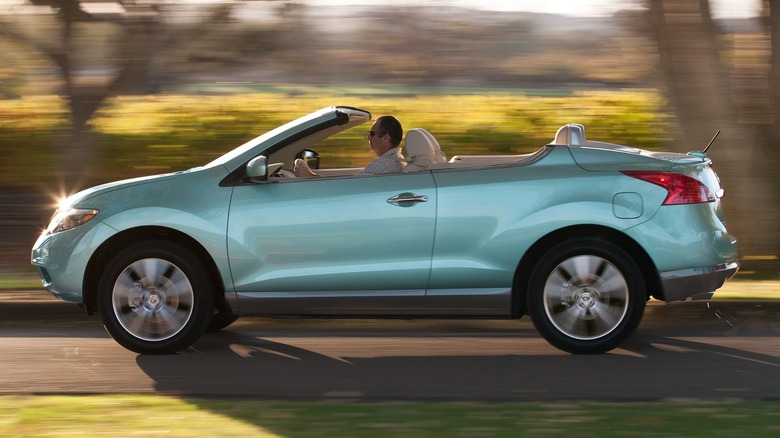 A 2011 Nissan Murano CrossCabriolet driving down a road