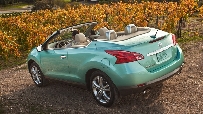 A 2011 Nissan Murano CrossCabriolet parked near a vineyard