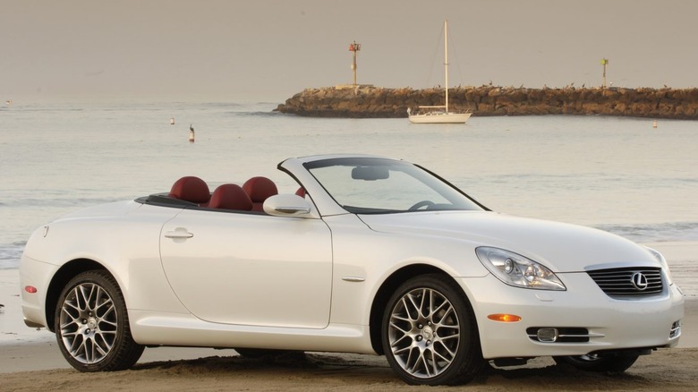 The Pebble Beach Edition of the 2008 Lexus SC 430 parked on the beach with the top down.