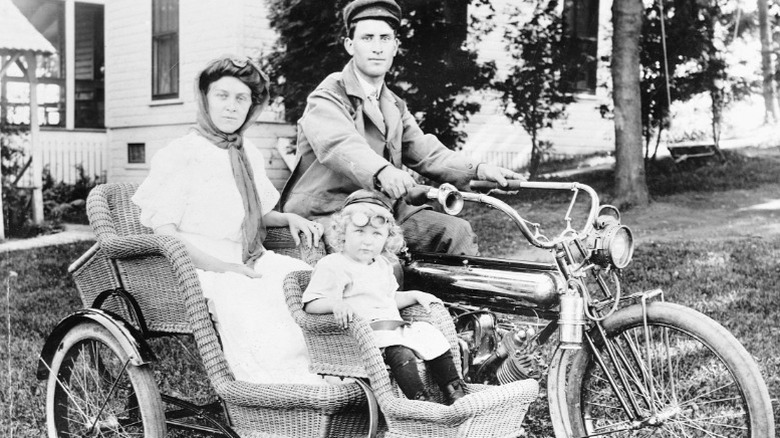 Edward Brewer carries his wife Mayme and son Edward Lucien on a Marsh & Metz motorcycle fitted with a wicker sidecar