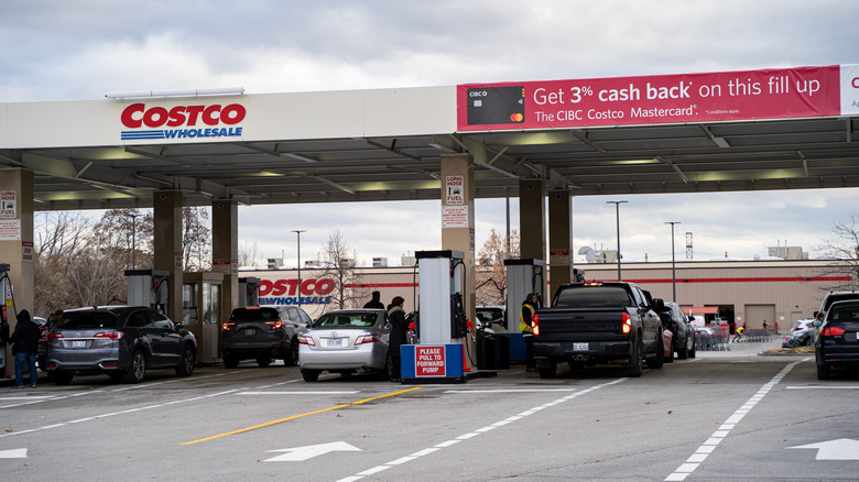 A Costco gas station with multiple cars refueling
