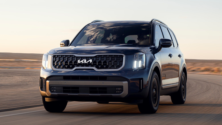 Front 3/4 of a 2023 Kia Telluride in motion.