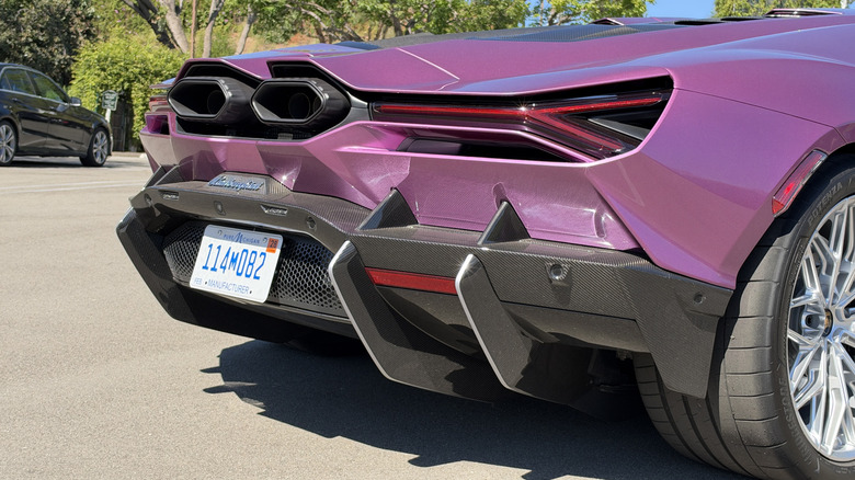 Rear end of a pink Lamborghini Revuelto