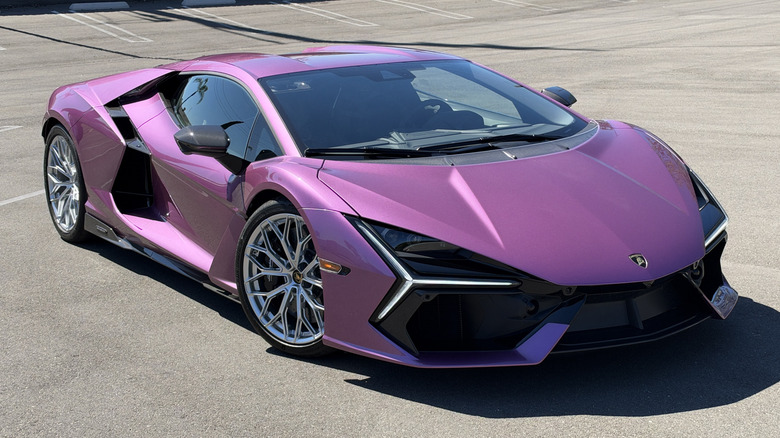 Front 3/4 view of a pink Lamborghini Revuelto