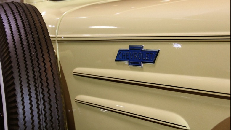 Close up of branding badge on 1936 Chevrolet Suburban on display at GM Heritage Collection.